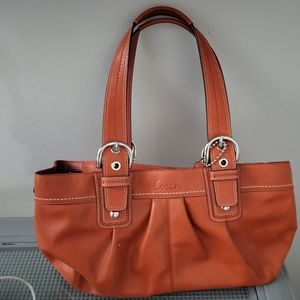 Coach Leather pumpkin color